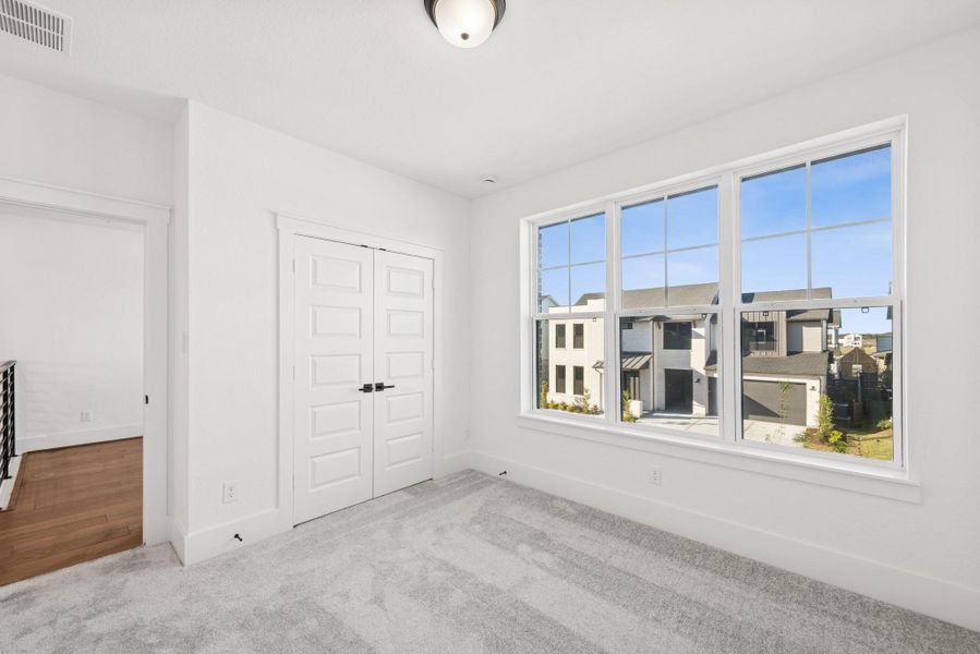 Spacious, unfurnished interior of a new home in Easthaven at Bridgeland Central - Vision Collection, Cypress (Image 30). Spacious, unfurnished interior of a new home in Easthaven at Bridgeland Central - Vision Collection, Cypress (Image 30).