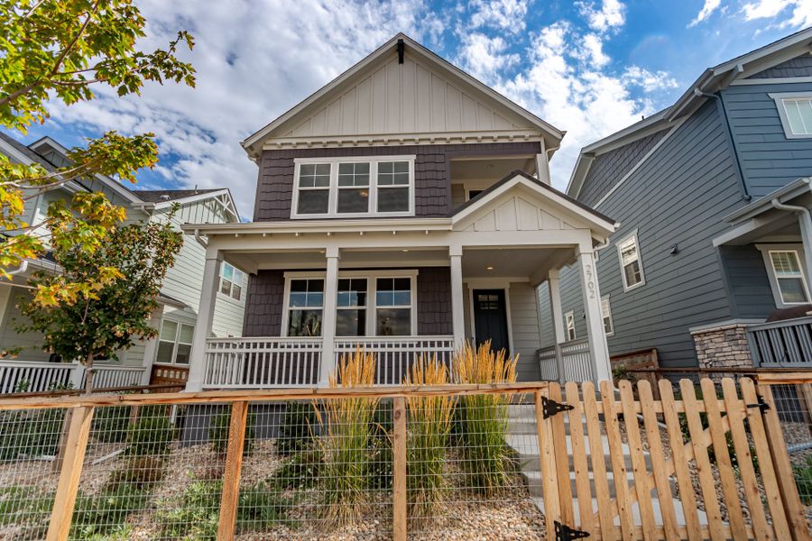 Front exterior of a new home in Arras Park, Thornton, CO, highlighting curb appeal (Image 2). Front exterior of a new home in Arras Park, Thornton, CO, highlighting curb appeal (Image 2).