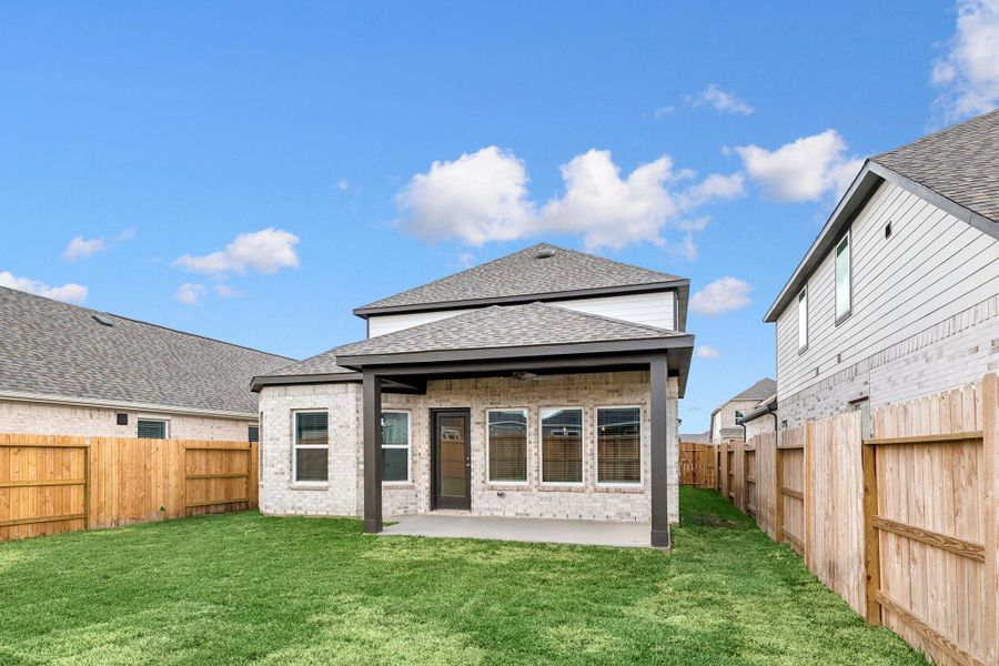 Exterior details and patio area of a home in Marvida, Cypress (Image 12).