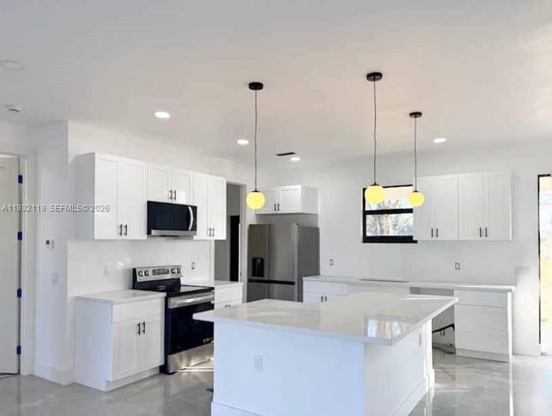 Furnished interior view inside a new home in , Clewiston (Image 11).