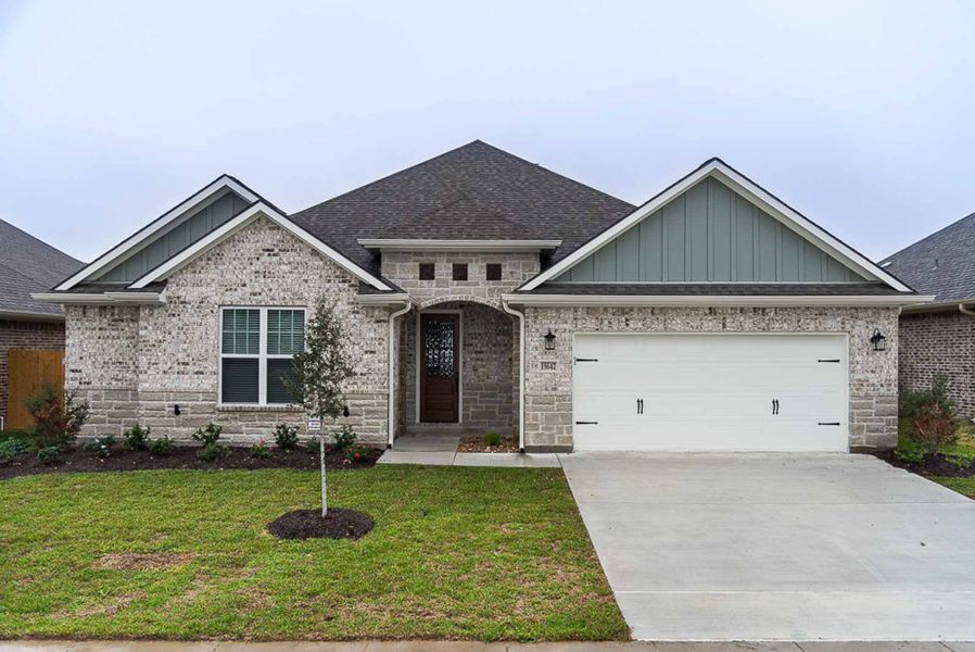 Representative exterior photo of a completed home built from the The Emily by Reece Homes in Oakmont, Bryan, TX (Image 24).