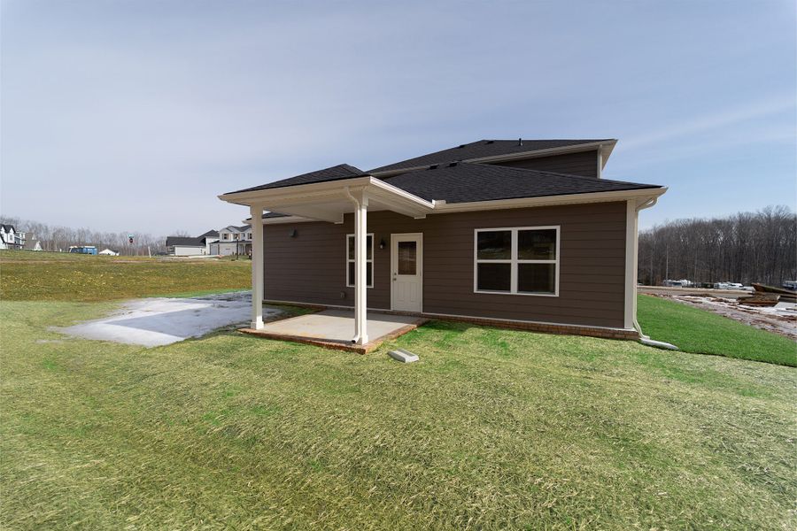Exterior details and patio area of a home in Brush Creek, Fairview (Image 4).