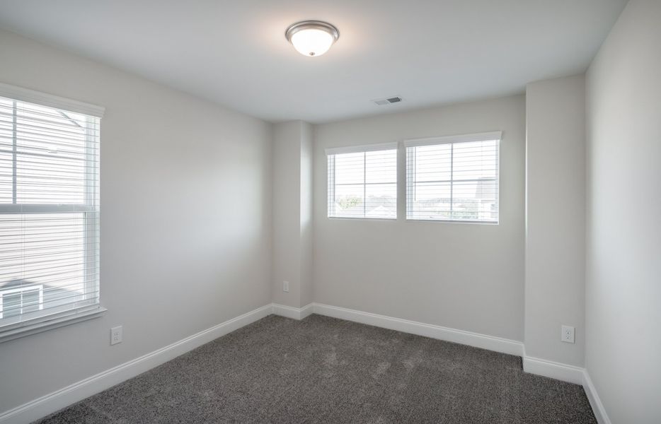 Representative unfurnished interior of a home built from the The Calle by Cothran Homes in Holly Ridge, Greenville (Image 27). Representative unfurnished interior of a home built from the The Calle by Cothran Homes in Holly Ridge, Greenville (Image 27).