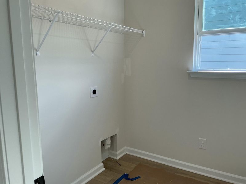 In-progress construction of a new home in Tea Farm: Presidents Series, Ravenel, SC (Image 25).