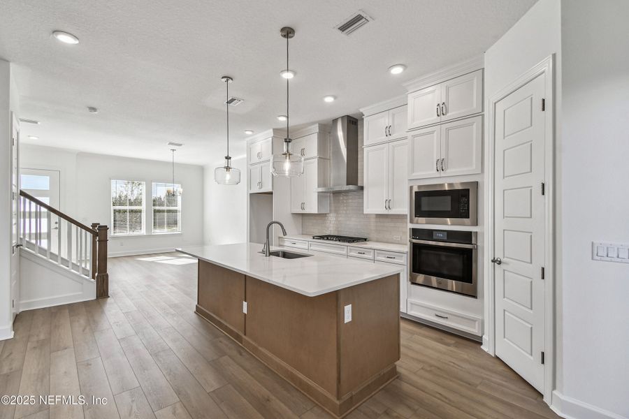 Furnished interior view inside a new home in Seven Pines 24' Rear Entry Townhomes, Jacksonville (Image 7).