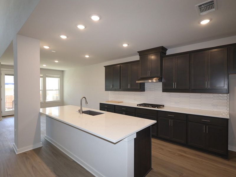 Furnished interior view inside a new home in Edgewood, Leander (Image 10). Furnished interior view inside a new home in Edgewood, Leander (Image 10).