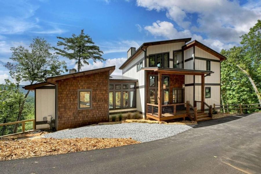 Front exterior of a new home in , Epworth, GA, highlighting curb appeal (Image 22).