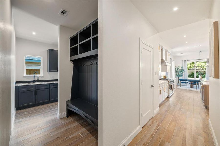 Mudroom featuring recessed lighting and light wood finished floors Mudroom featuring recessed lighting and light wood finished floors