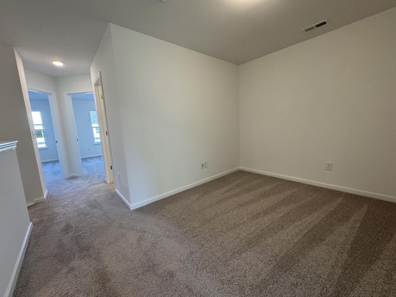 Spacious, unfurnished interior of a new home in East Main Townes, Spartanburg (Image 15).