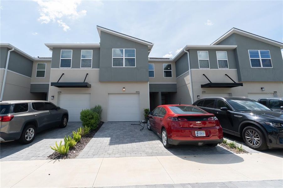 Front exterior of a new home in , Brandon, FL, highlighting curb appeal (Image 22).