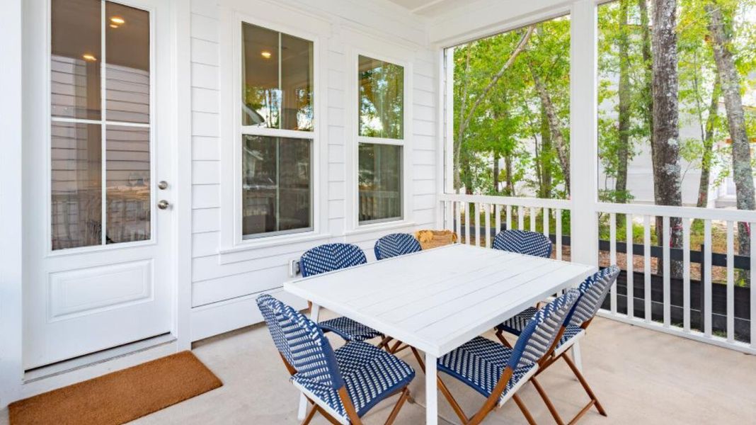 Exterior details and patio area of a home in Heron's Walk at Summers Corner: Row Collection, Summerville (Image 2). Exterior details and patio area of a home in Heron's Walk at Summers Corner: Row Collection, Summerville (Image 2).