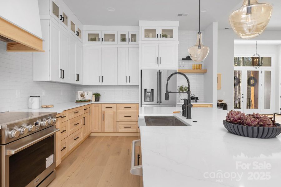 Previous build by NewGen Builders, LLC showing planned design and finishes