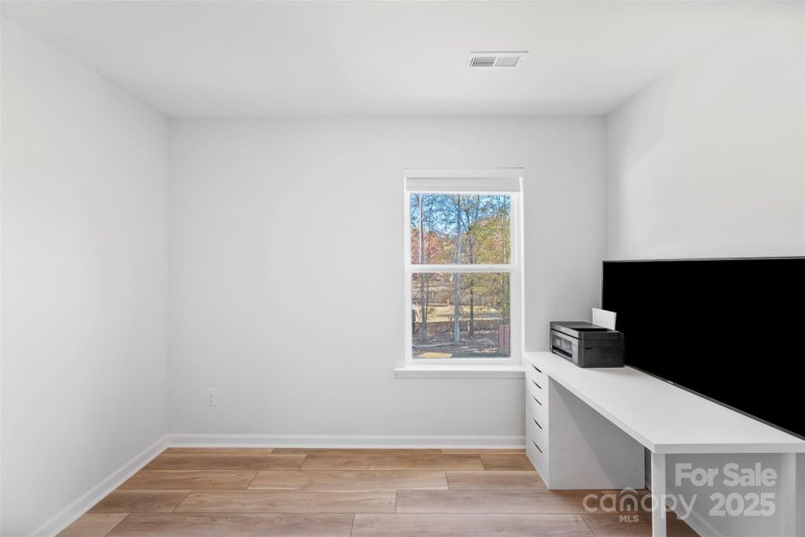Spacious, unfurnished interior of a new home in Surrey Woods, Charlotte (Image 24).