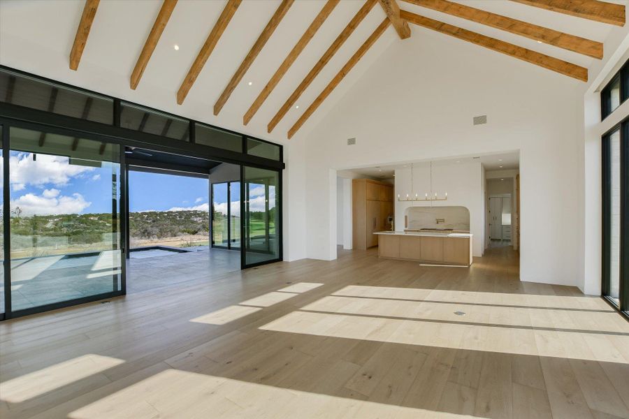 Unfurnished living room featuring light wood finished floors and recessed lighting