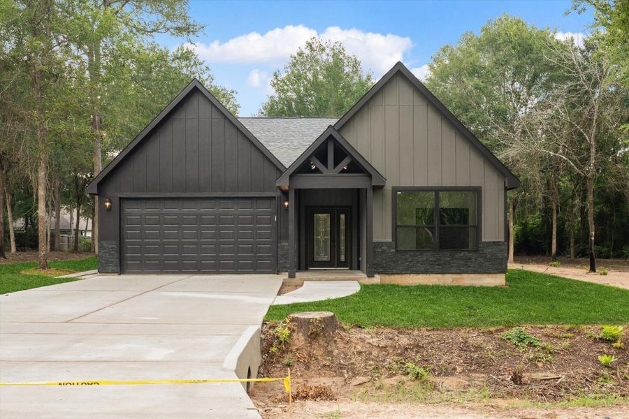 Front exterior of a new home in , Hempstead, TX, highlighting curb appeal (Image 22). Front exterior of a new home in , Hempstead, TX, highlighting curb appeal (Image 22).