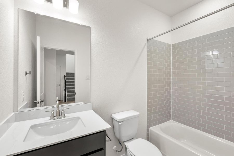 Furnished interior view inside a new home in Salerno - Classic Collection, Round Rock (Image 6).