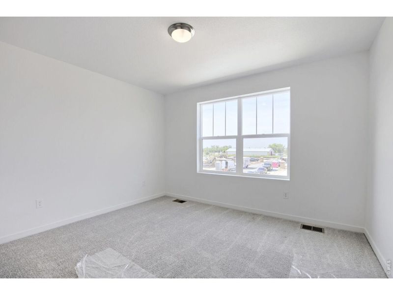Spacious, unfurnished interior of a new home in Timber Lark, Fort Collins (Image 9).