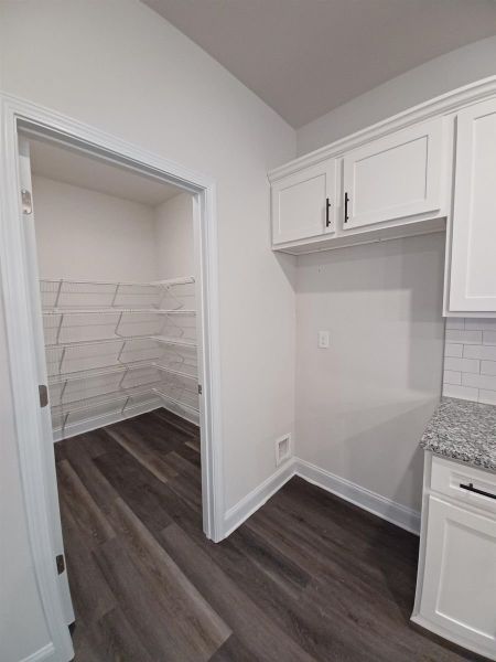 Representative unfurnished interior of a home built from the 2408 by Adams Homes in Rockfish Pointe, Wallace (Image 11).