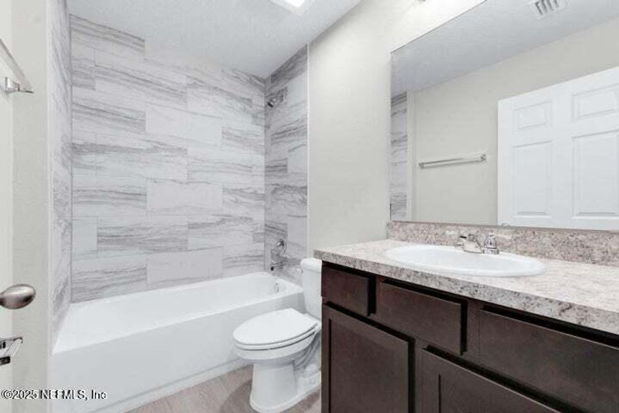 Furnished interior view inside a new home in , Jacksonville (Image 16). Furnished interior view inside a new home in , Jacksonville (Image 16).