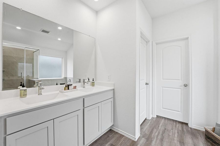 Primary ensuite bath with double vanities Primary ensuite bath with double vanities