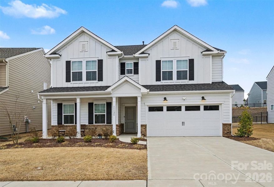 Front exterior of a new home in , Charlotte, NC, highlighting curb appeal (Image 27).