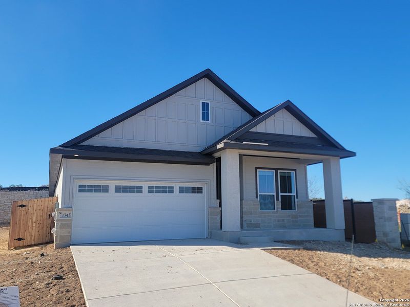Front exterior of a new home in Meyer Ranch, New Braunfels, TX, highlighting curb appeal (Image 1). Front exterior of a new home in Meyer Ranch, New Braunfels, TX, highlighting curb appeal (Image 1).