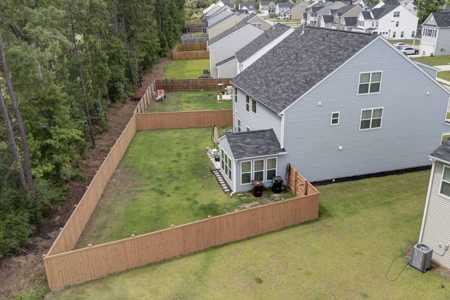 Exterior details and patio area of a home in Oakley Pointe, Moncks Corner (Image 3). Exterior details and patio area of a home in Oakley Pointe, Moncks Corner (Image 3).