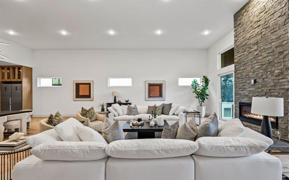 Living room featuring hardwood / wood-style floors and a fireplace