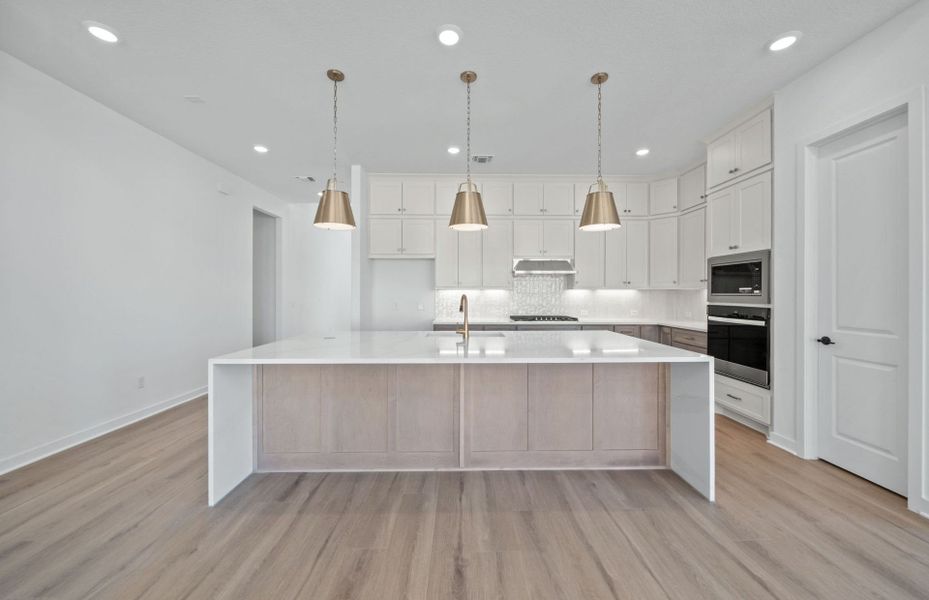Furnished interior view inside a new home in 6 Creeks, Kyle (Image 9).