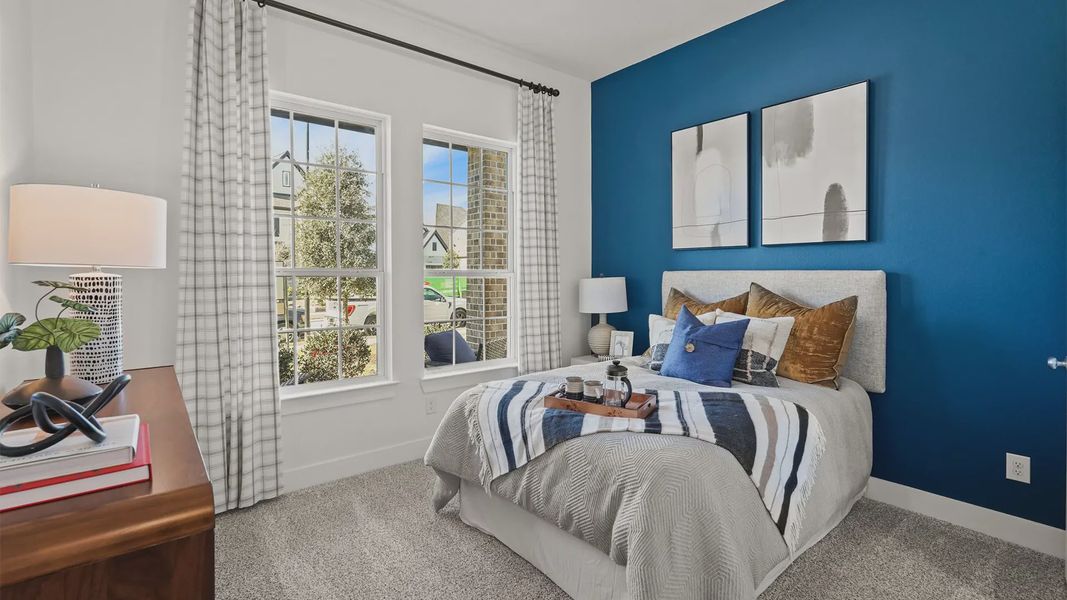 Representative furnished interior of a home built from the Medina by Chesmar Homes in Elyson 50's, Katy (Image 4).