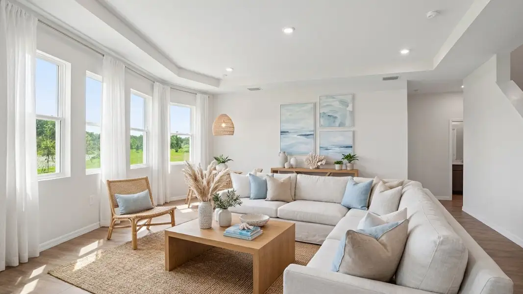 Representative furnished interior of a home built from the Holden by D.R. Horton in Deerbrook, Land O' Lakes (Image 4).