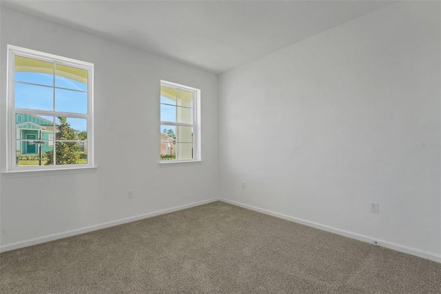 Spacious, unfurnished interior of a new home in Green Key Village, Lady Lake (Image 24).