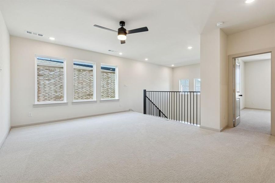 The spacious game room in our Bella plan provides the perfect place to host those big game day parties or family game night!