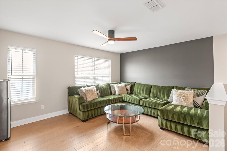 This huge loft area could be a great second-floor living room, a second work space, a reading nook, a play area...