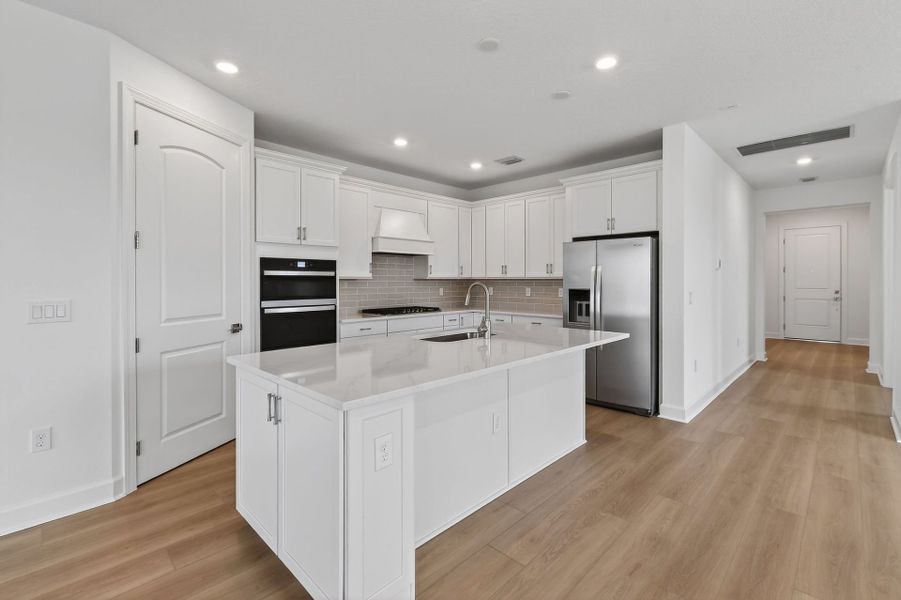 Furnished interior view inside a new home in Del Webb Tradition, Port St. Lucie (Image 13).