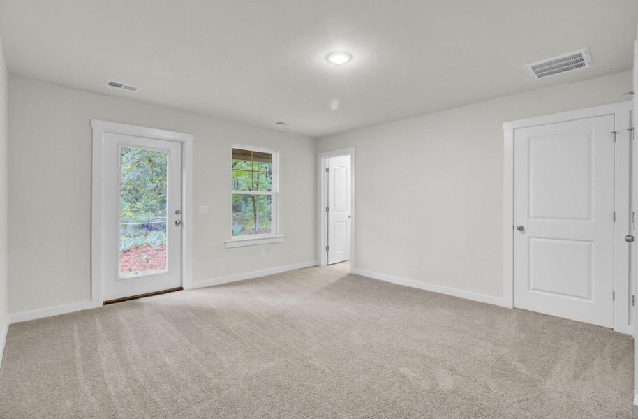 Spacious, unfurnished interior of a new home in Indigo Grove Townhomes, Johns Island (Image 33).