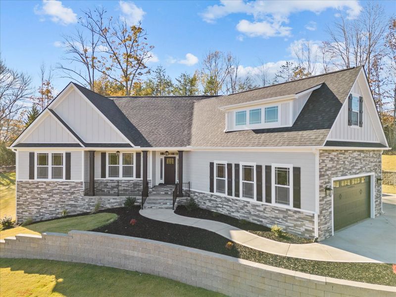 Representative exterior photo of a completed home built from the Drayton Elite by Enchanted Homes in Smokey Hills, Campobello, SC (Image 18).