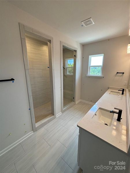 Large walk-in shower in primary bathroom