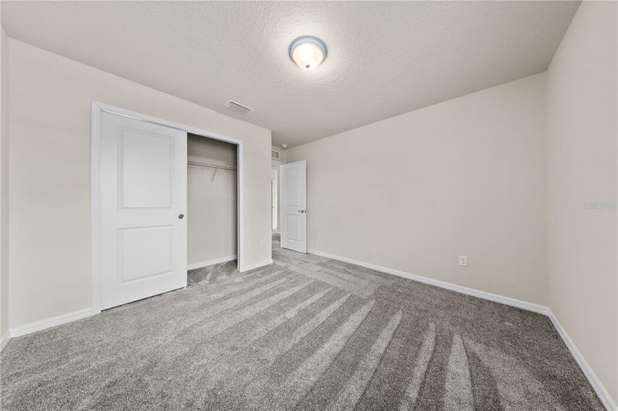 Spacious, unfurnished interior of a new home in EverBe, Orlando (Image 38).