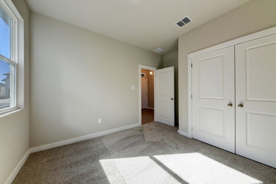 Representative unfurnished interior of a home built from the Sophora by Hakes Brothers in Hickory Ridge Estates, Elmendorf (Image 17). Representative unfurnished interior of a home built from the Sophora by Hakes Brothers in Hickory Ridge Estates, Elmendorf (Image 17).