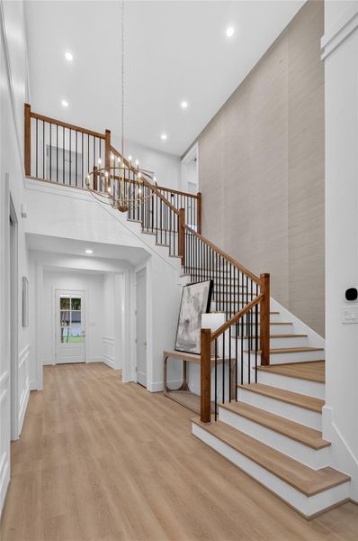 The custom staircase combines timeless craftsmanship with contemporary elegance, creating a stunning architectural feature within the home. The custom staircase combines timeless craftsmanship with contemporary elegance, creating a stunning architectural feature within the home.