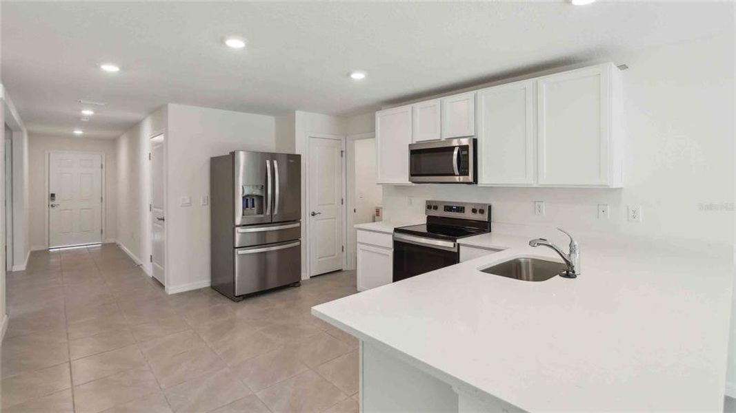 Furnished interior view inside a new home in Triumph South, Wildwood (Image 10). Furnished interior view inside a new home in Triumph South, Wildwood (Image 10).