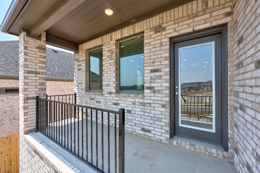 Covered Patio in the Magnolia home plan by Trophy Signature Homes – REPRESENTATIVE PHOTO Covered Patio in the Magnolia home plan by Trophy Signature Homes – REPRESENTATIVE PHOTO