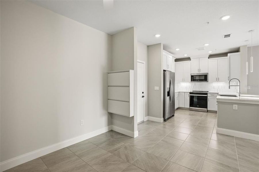 Furnished interior view inside a new home in Gatherings® of Lake Nona, Orlando (Image 9).