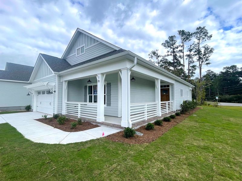 Representative exterior photo of a completed home built from the Jamestown by Bill Clark Homes in Osprey Landing, Southport, NC (Image 14).