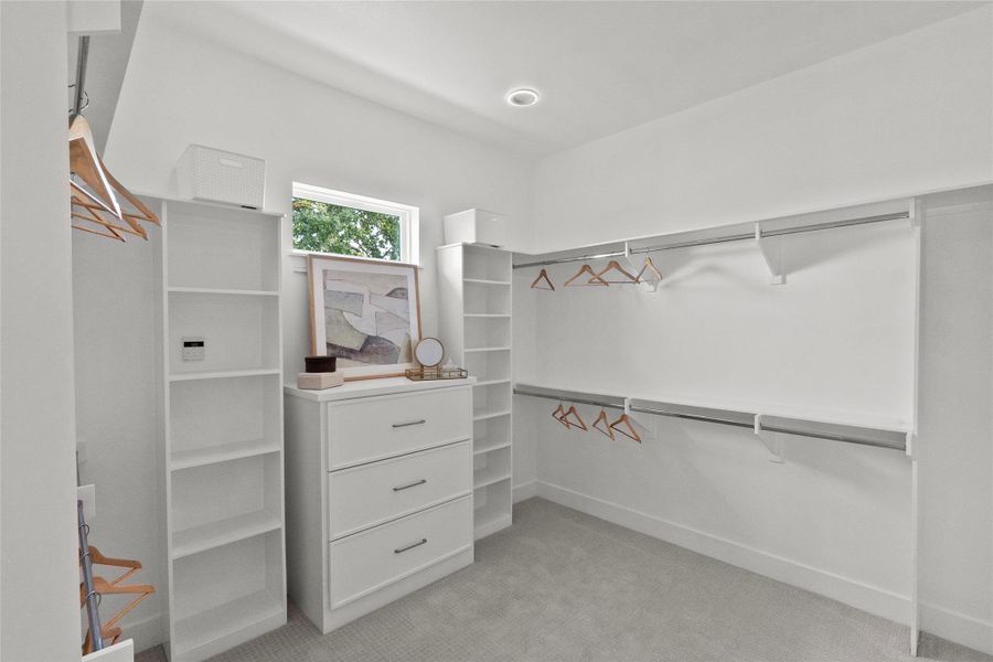 Primary Closet w/ Metal Rods