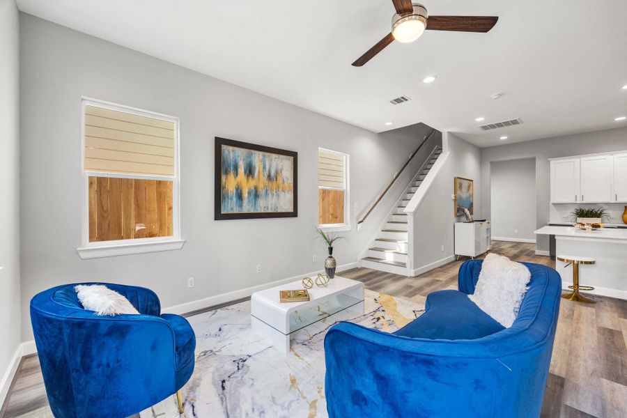 The ROCcreek features a bright, open living room designed for effortless entertaining and stylish everyday comfort. Image depicts similar floorplan in another ROC Homes community. The ROCcreek features a bright, open living room designed for effortless entertaining and stylish everyday comfort. Image depicts similar floorplan in another ROC Homes community.