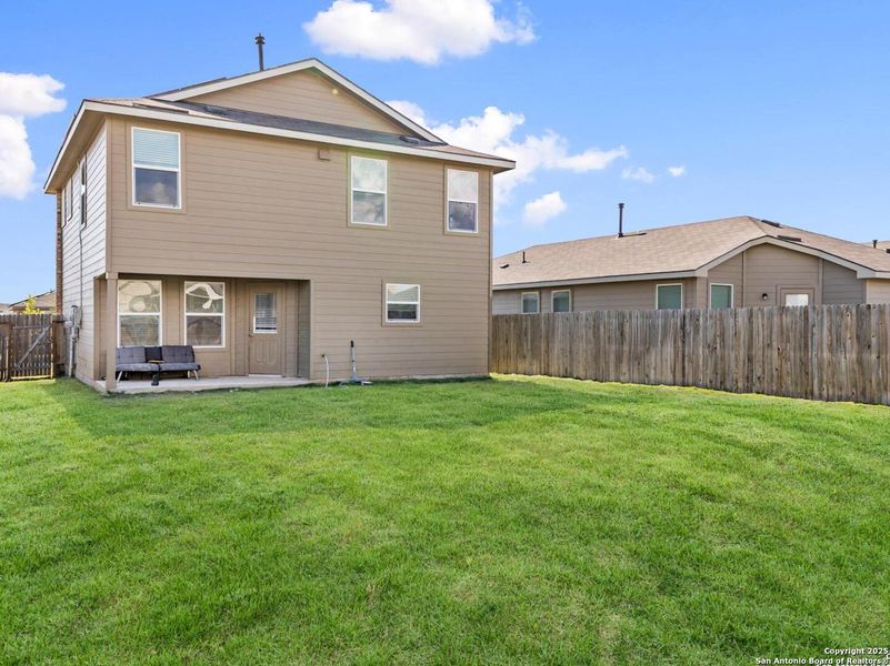 Exterior details and patio area of a home in Whisper Falls, San Antonio (Image 18).