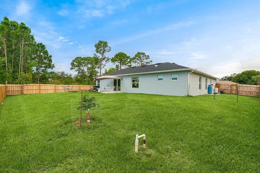Front exterior of a new home in , Vero Beach, FL, highlighting curb appeal (Image 23). Front exterior of a new home in , Vero Beach, FL, highlighting curb appeal (Image 23).