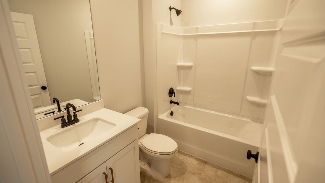 Furnished interior view inside a new home in Pottsview, Smyrna (Image 8).